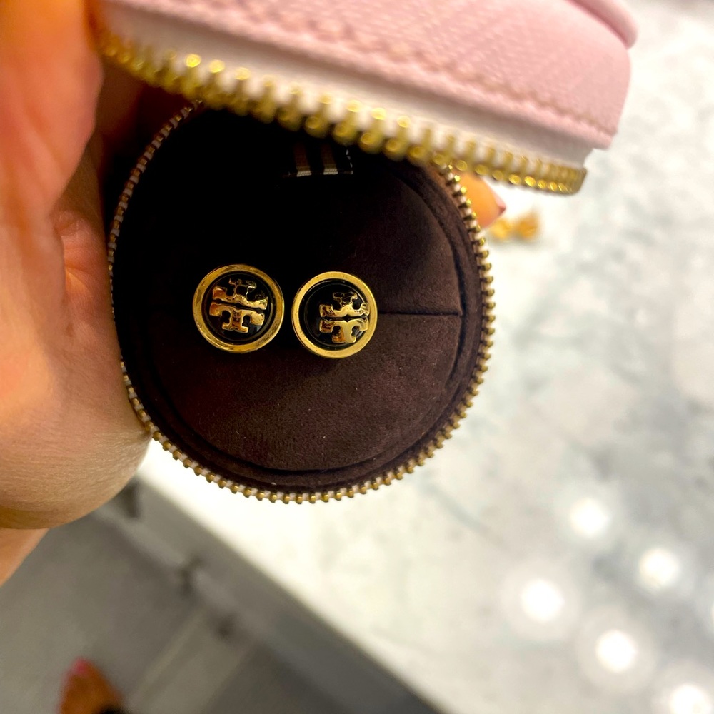 Tory Burch black and gold earrings.